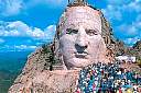 1998 - Participants on the annual June hike up the mountain give size perspective to the completed face, dedicated June 3, 1998.