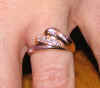 It's called a Cabana Ring, but engagement ring it is now.  (116526 bytes)