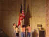 Boy Scout troop retires the flag for the night